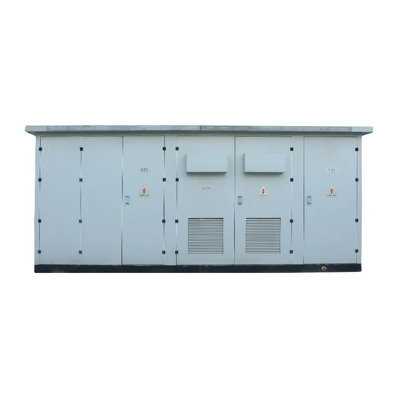 Long face of a gray YBM photovoltaic step-up station enclosure